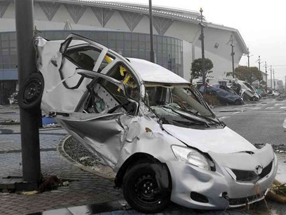 Toyota wrecked by tsunami Toyota wrecked by tsunami