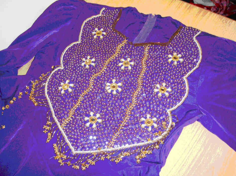 An elaborate Afghan dress made by Kamila and her team of dressmakers. Courtesy Gayle Tzemach Lemmon.