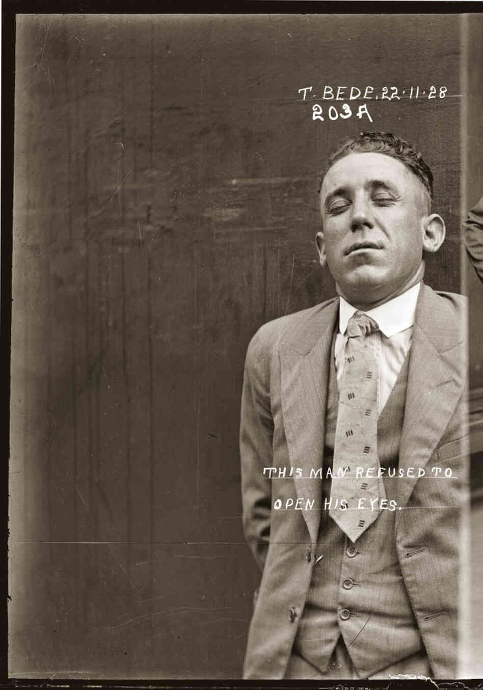 Mug shot of Thomas Bede, Nov. 22, 1928, Central Police Station, Sydney. (On the image is says, "This man refused to open his eyes.") Mug shot of Thomas Bede, Nov. 22, 1928, Central Police Station, Sydney. (On the image is says, "This man refused to open his eyes.")