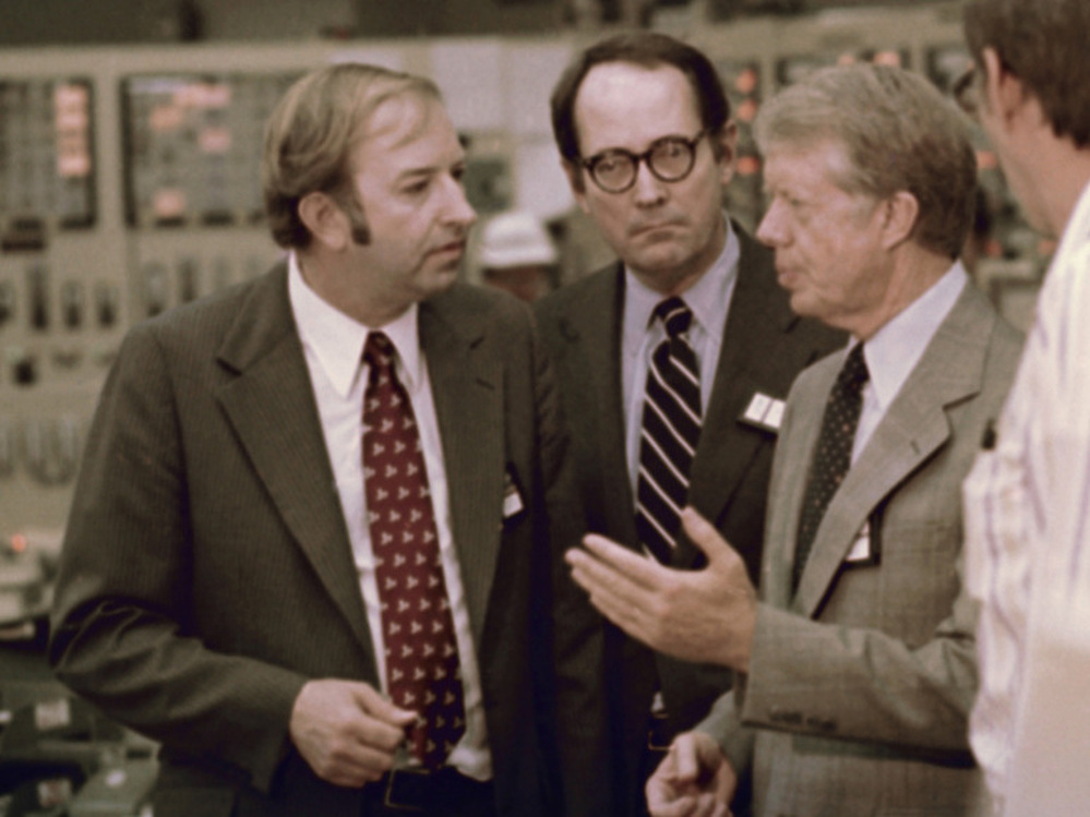 U.S. President Jimmy Carter (from right) meets April 1, 1979, with Pennsylvania Gov. Dick Thornburgh and Nuclear Regulatory Commission official Harold Denton in the control room of the Three Mile Island nuclear plant in Middletown, Pa.