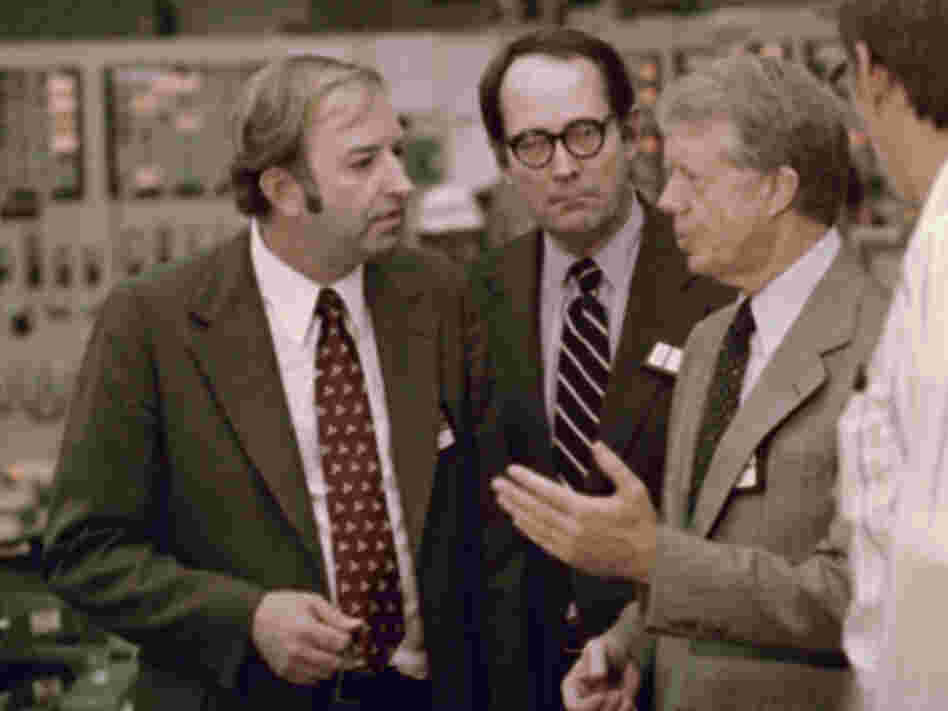 U.S. President Jimmy Carter (from right) meets April 1, 1979, with Pennsylvania Gov. Dick Thornburgh and Nuclear Regulatory Commission official Harold Denton in the control room of the Three Mile Island nuclear plant in Middletown, Pa.
