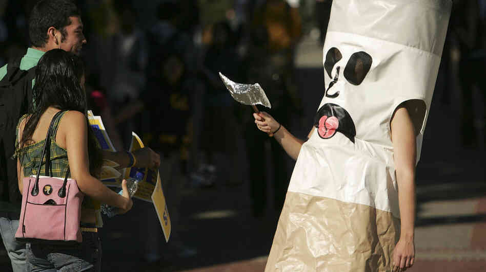 A person dressed as a cigarette encourages students at the University of California, Berkeley to quit smoking back in 2005.