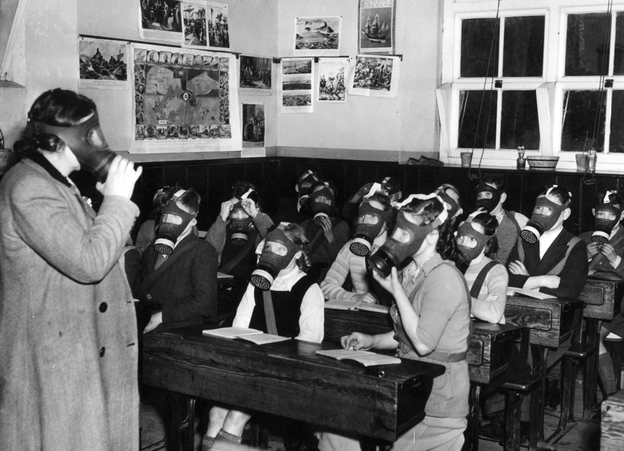 On Feb. 14, 1950, the headmistress of the village school in Shropshire, England, supervises the children in their monthly gas mask drill.