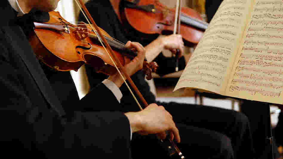 Man playing the violin.