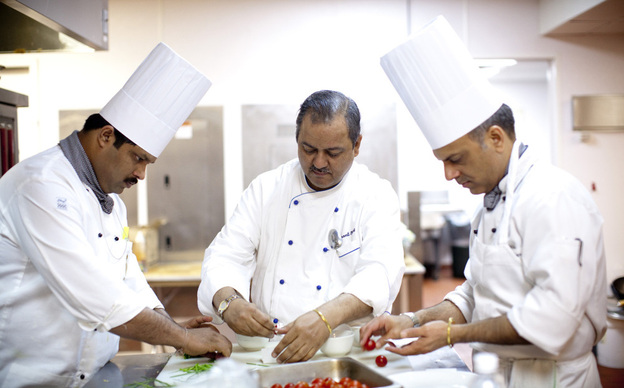 Oberoi (center) has worked for nearly 30 years at the Taj Mahal Palace and Towers, a luxury hotel in Mumbai. He was working at the hotel on Nov. 26, 2008 — the day terrorists attacked The Taj and several other sites in Mumbai. Gunmen roamed the halls of the hotel for hours, shooting anyone in sight.