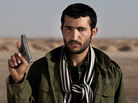 An anonymous portrait of a Libyan rebel warrior in the crossroad town of Ajdabiya in early March. An anonymous portrait of a Libyan rebel warrior in the crossroad town of Ajdabiya in early March.