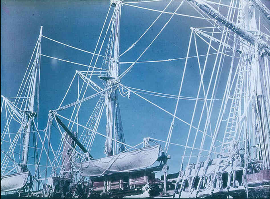 The rigging of the Endurance is highlighted by rime — brilliant white ice left by freezing fog.