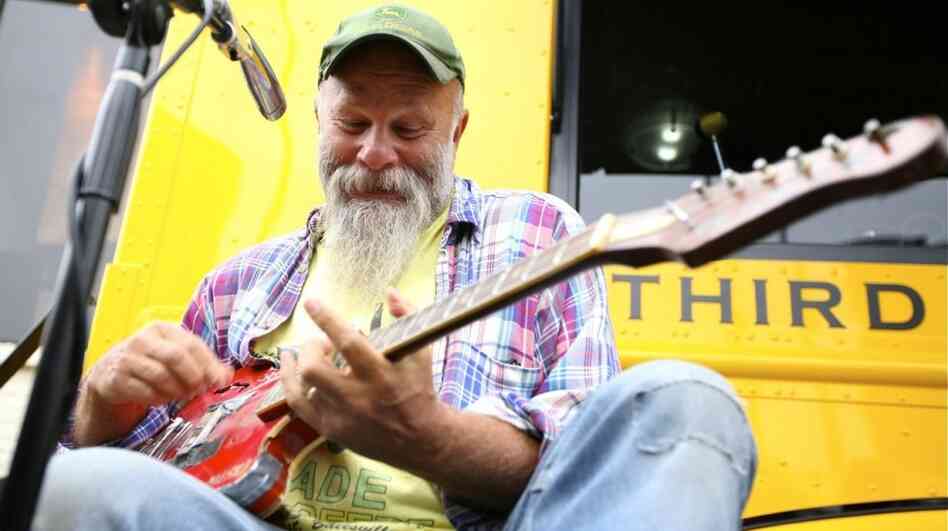 With only three strings, Seasick Steve plays some blues at the Third Man Records Truck.