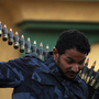 A rebel carried an ammunition belt in the streets of the eastern Libyan coastal town of Tobruk near the border with Egypt on Wednesday (March 16, 2011).
