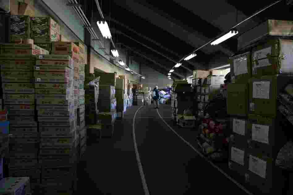 Relief supplies sent from around Japan are piled up in Koriyama, Fukushima prefecture. 
