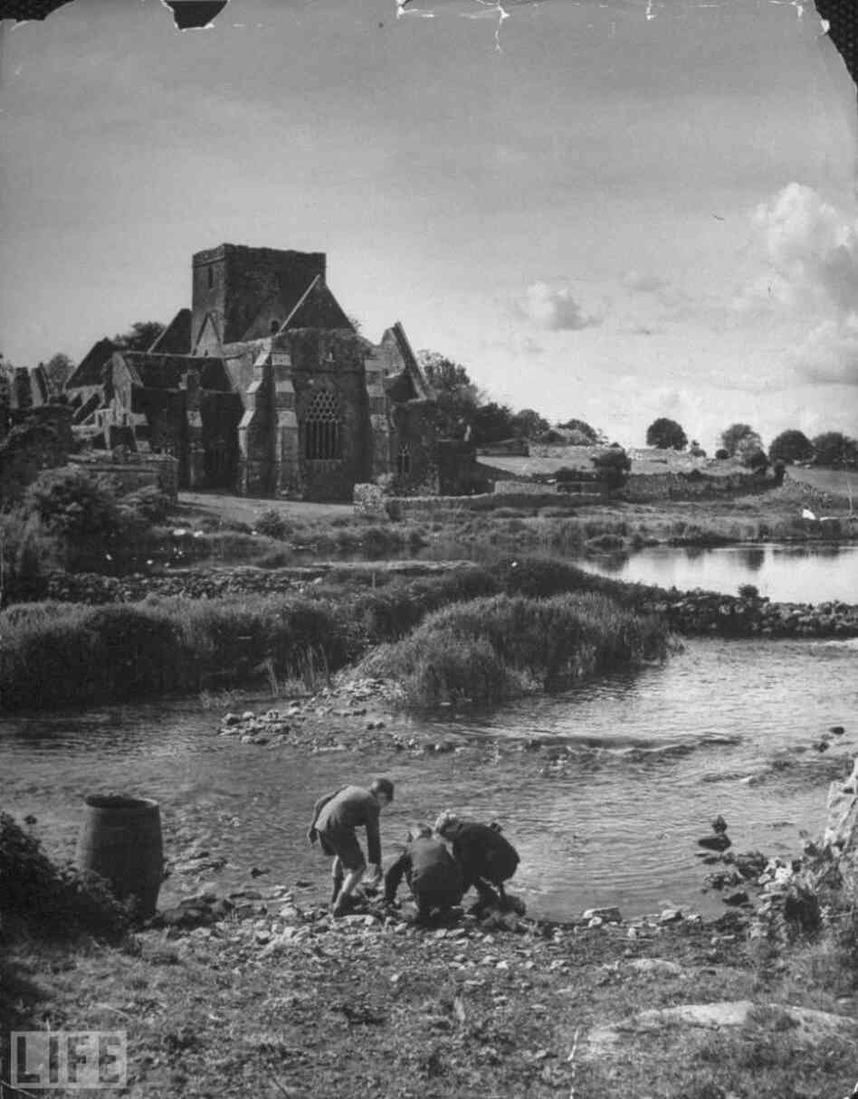 Children play in front of a ruined church, 1946 Children play in front of a ruined church, 1946