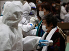 Evacuees are screened for radiation exposure at a testing center in Koriyama city, Fukushima prefecture, northern Japan. Evacuees are screened for radiation exposure at a testing center in Koriyama city, Fukushima prefecture, northern Japan.