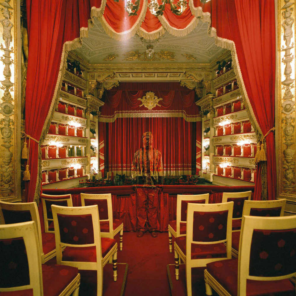 The artist has taken photos for his Invisible Man series all around the world, including at La Scala, the renowned opera house in Milan, Italy.