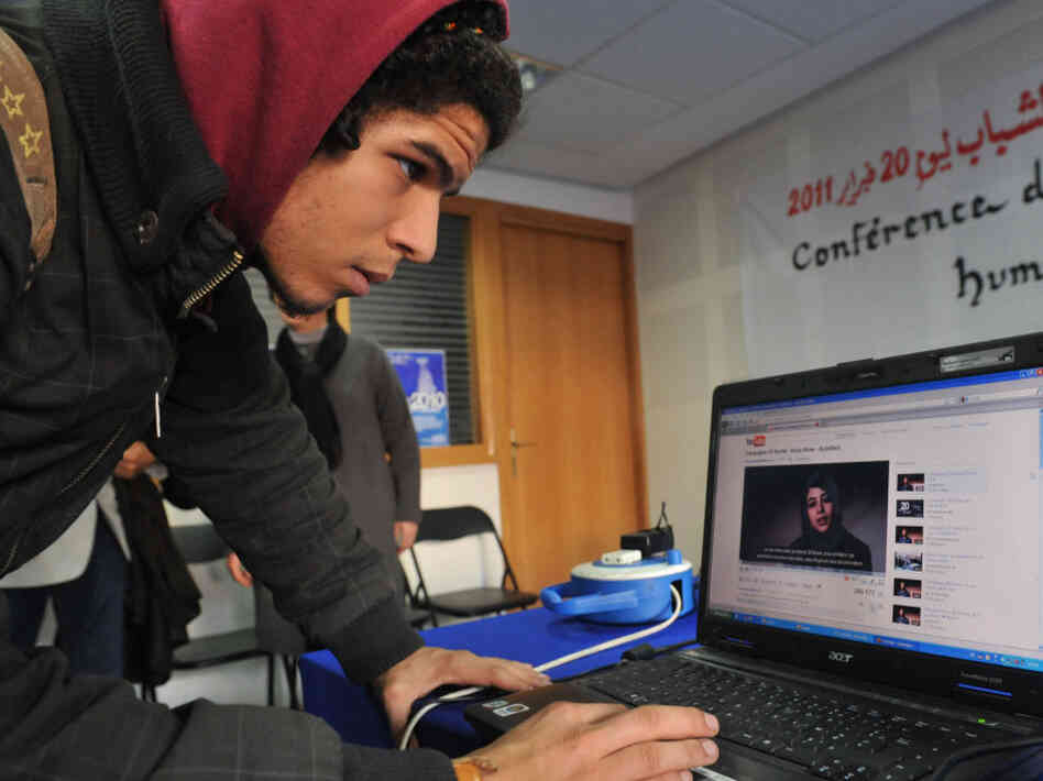 A young Moroccan watches a video on Feb. 17, calling for demonstrations. Three days later, the demonstration organized by a coalition of groups took place in cities throughout the country. U.S. intelligence officials say that in hindsight, using open sources like Facebook and Twitter could have helped them predict the uprisings that have swept the Arab world.