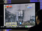 South Korean passengers watch a broadcast of the situation at the Fukushima Dai-ichi nuclear plant from a train station. There have been no major changes to the situation at the nuclear power plant in a few days. South Korean passengers watch a broadcast of the situation at the Fukushima Dai-ichi nuclear plant from a train station. There have been no major changes to the situation at the nuclear power plant in a few days.