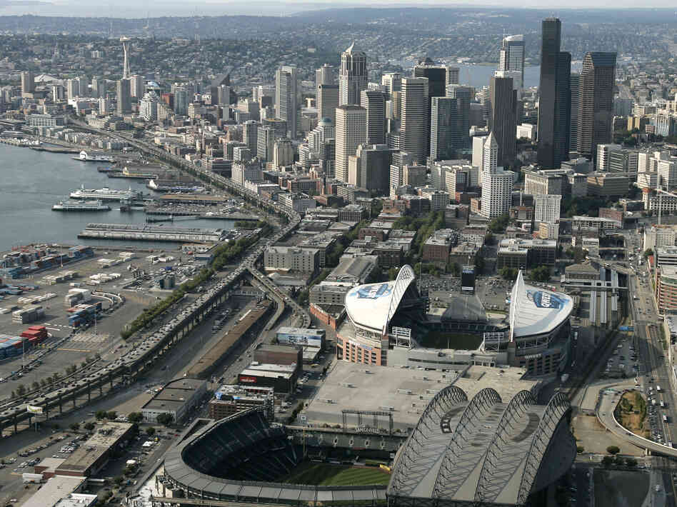 The Alaskan Way Viaduct, the raised two-level highway that runs along Seattle's downtown waterfront, is seen from the air in 2006. Seattle is now replacing it to improve mobility for people and goods. The Alaskan Way Viaduct, the raised two-level highway that runs along Seattle's downtown waterfront, is seen from the air in 2006. Seattle is now replacing it to improve mobility for people and goods.