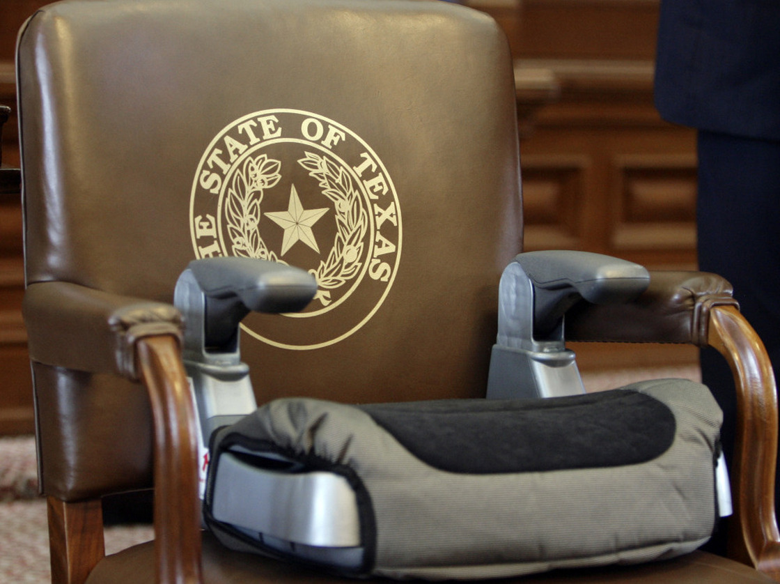 A booster seat sits atop a chair in the Texas House of Representatives back in 2009, when a bill was passed requiring their use for kids under 8 years old.