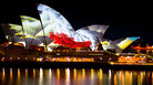 Projections on the giant sails of the Sydney Opera House, which served as the venue for the YouTube Symphony Orchestra concert. Projections on the giant sails of the Sydney Opera House, which served as the venue for the YouTube Symphony Orchestra concert.