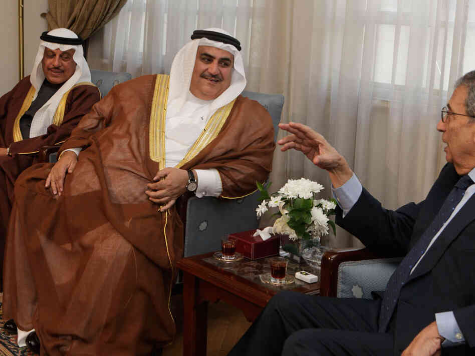 Amr Moussa, secretary-general of the Arab League (right), meets with Bahraini Foreign Minister Sheikh Khaled bin Ahmed al-Khalifa at the Arab League headquarters in Cairo on Tuesday. Amr Moussa, secretary-general of the Arab League (right), meets with Bahraini Foreign Minister Sheikh Khaled bin Ahmed al-Khalifa at the Arab League headquarters in Cairo on Tuesday.