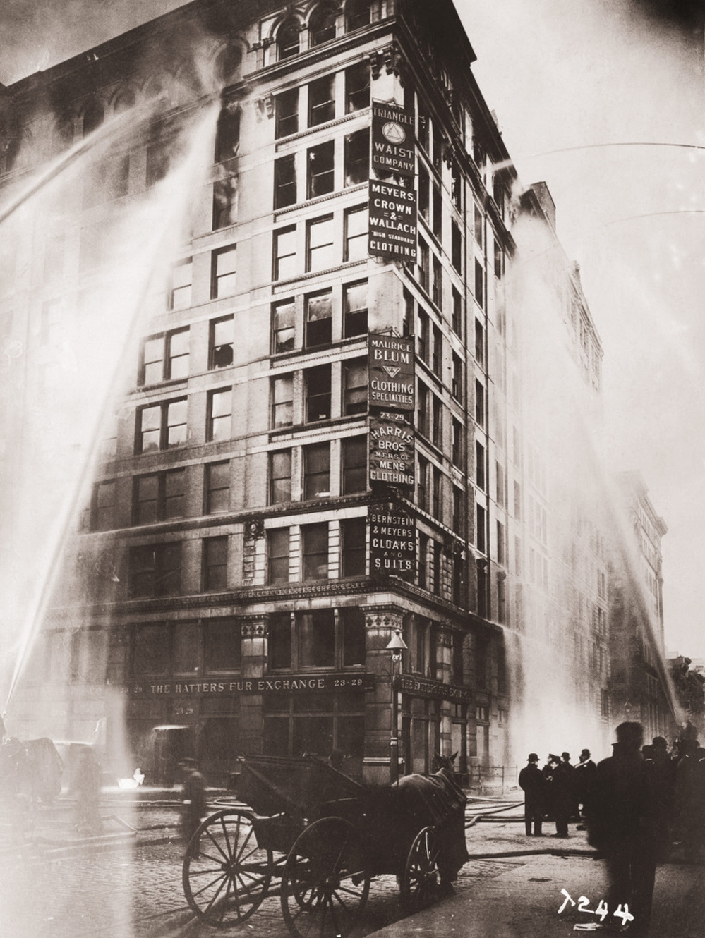 In Flames: Firefighters spray water on the upper floors of the Asch Building, which housed the Triangle Shirtwaist Company. Many workers died after jumping from the 10-story building.