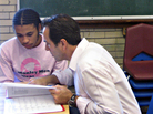 Construction teacher Michael Dimitroff talks with a student about his progress toward graduation during an advisory period. The school wants every student to form a strong bond with at least one teacher this year, part of its recipe for a calmer culture. Construction teacher Michael Dimitroff talks with a student about his progress toward graduation during an advisory period. The school wants every student to form a strong bond with at least one teacher this year, part of its recipe for a calmer culture.