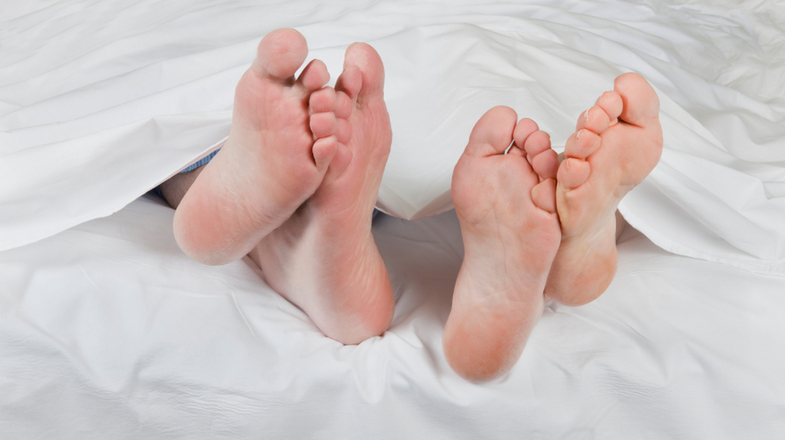 Two people in bed
