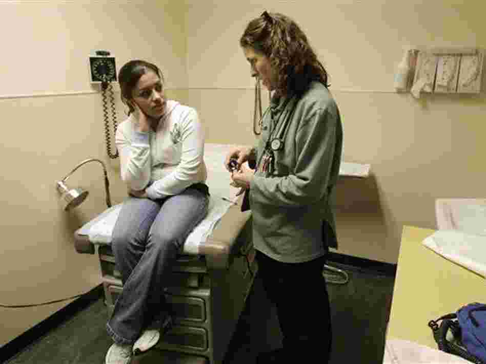 Dr. Sarah Hufbauer, a family practice doctor at a Seattle clinic, with a patient, Feb. 4, 2011. Dr. Sarah Hufbauer, a family practice doctor at a Seattle clinic, with a patient, Feb. 4, 2011.