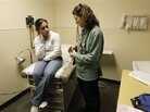 Dr. Sarah Hufbauer, a family practice doctor at a Seattle clinic, with a patient, Feb. 4, 2011. Dr. Sarah Hufbauer, a family practice doctor at a Seattle clinic, with a patient, Feb. 4, 2011.