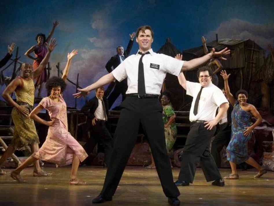 Andrew Rannells (center) and Josh Gad are two missionaries out of their depth in Northern Uganda in The Book of Mormon -- a new musical comedy from the creators of South Park and one of the men behind Avenue Q.