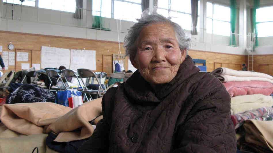 Hisaho Koseki, 82, barely escaped the tsunami when a neighbor drove her to safety. Now she's at a local evacuation center in Kesennuma, Miyagi prefecture. Her son has offered to take her in, but she doesn't want to burden him. "I have chronic ailments, and I don't know how much longer I'll live. I don't want to die, but in this situation, perhaps it would be better if I did," she says. Hisaho Koseki, 82, barely escaped the tsunami when a neighbor drove her to safety. Now she's at a local evacuation center in Kesennuma, Miyagi prefecture. Her son has offered to take her in, but she doesn't want to burden him. "I have chronic ailments, and I don't know how much longer I'll live. I don't want to die, but in this situation, perhaps it would be better if I did," she says.
