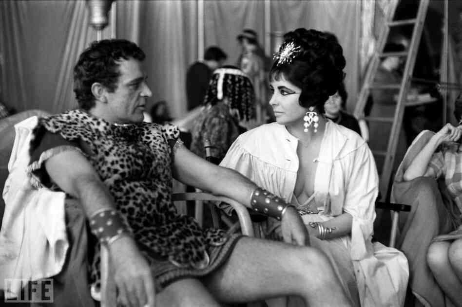 In costume as Marc Antony and Cleopatra, Richard Burton and Taylor take a break on the set of Cleopatra. They would marry not once, but twice. See more photos of Burton and Taylor. In costume as Marc Antony and Cleopatra, Richard Burton and Taylor take a break on the set of Cleopatra. They would marry not once, but twice. See more photos of Burton and Taylor.
