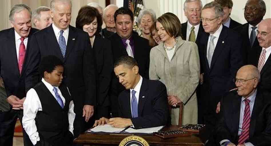 President Barack Obama signs the health care bill into law, March 23, 2010. President Barack Obama signs the health care bill into law, March 23, 2010.