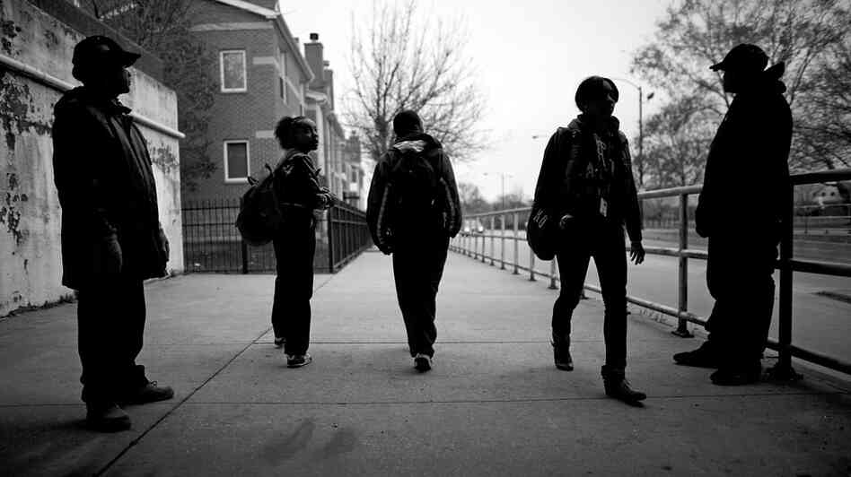 Chicago Public Schools' Safe Passage program places adults along the routes students take to and from school to keep an eye out for trouble. Chicago Public Schools' Safe Passage program places adults along the routes students take to and from school to keep an eye out for trouble.