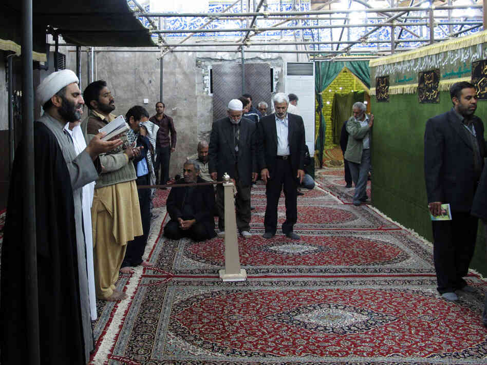 People pray inside the Askariya shrine, which is being rebuilt after a bombing five years ago. People pray inside the Askariya shrine, which is being rebuilt after a bombing five years ago.