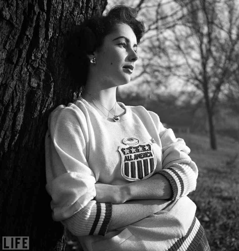 Photographer Mark Kauffman captured the young actress and her home life in 1948. The pin she is wearing belonged to Glenn Davis, a 1946 Heisman Trophy-winning athlete she was dating at the time. Photographer Mark Kauffman captured the young actress and her home life in 1948. The pin she is wearing belonged to Glenn Davis, a 1946 Heisman Trophy-winning athlete she was dating at the time.