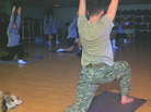 A soldier moves into the crescent pose at a daily yoga class offered at Fort Campbell in Kentucky. A soldier moves into the crescent pose at a daily yoga class offered at Fort Campbell in Kentucky.