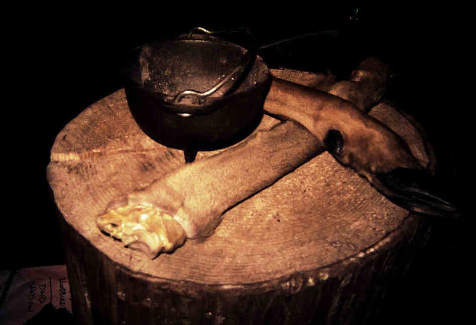 An Agalloch concert is a ritual. A kettle and deer hooves rested on a log at the front of the stage along with burning incense.