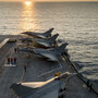 French jet fighters sit ready on the deck of the Charles de Gaulle aircraft carrier in the Mediterranean Sea. French jet fighters sit ready on the deck of the Charles de Gaulle aircraft carrier in the Mediterranean Sea.