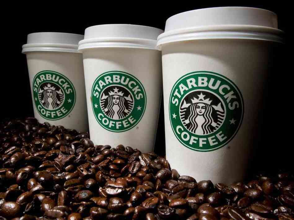 Starbucks coffee cups and beans Starbucks coffee cups and beans