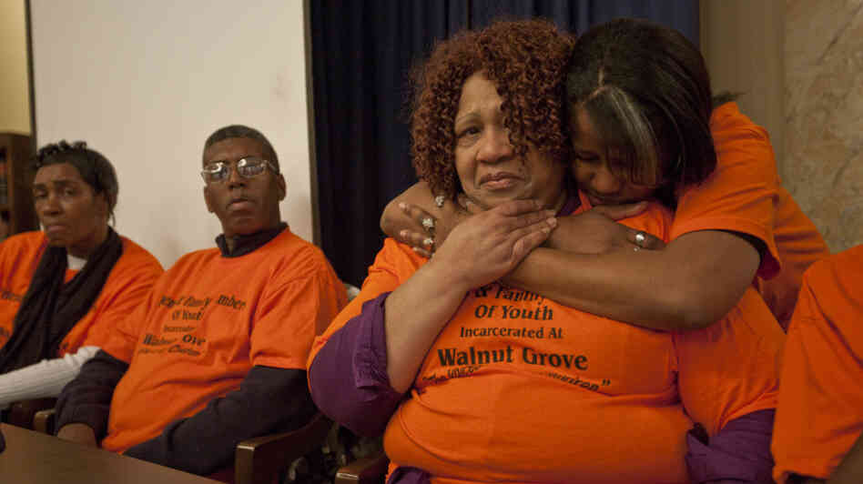 Families of youth incarcerated at the Walnut Grove Youth Correctional Facility in Mississippi listen to testimony at a hearing about alleged inmate abuse.