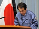 Japanese Prime Minister Naoto Kan bows as he holds a news conference in Tokyo on March 25, 2011. Japanese Prime Minister Naoto Kan bows as he holds a news conference in Tokyo on March 25, 2011.