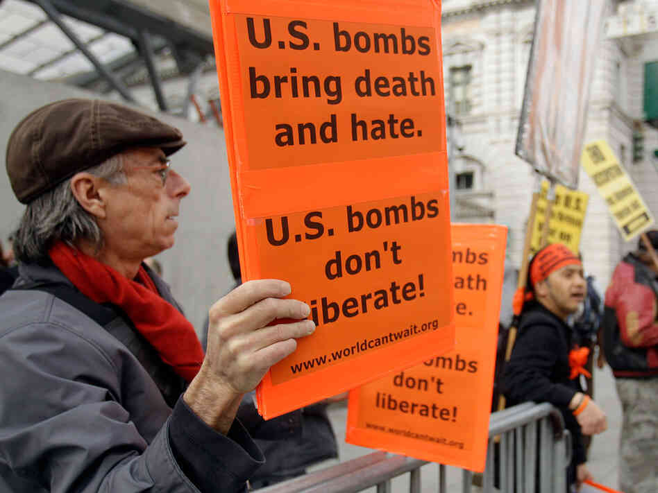 Picketers protest the American involvement in Libya on Wednesday in San Francisco. Picketers protest the American involvement in Libya on Wednesday in San Francisco.