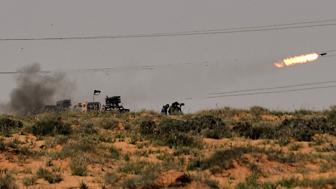 Rebels fired missiles at forces loyal to Libyan leader Moammar Gadhafi near the town of Bin Jawad.