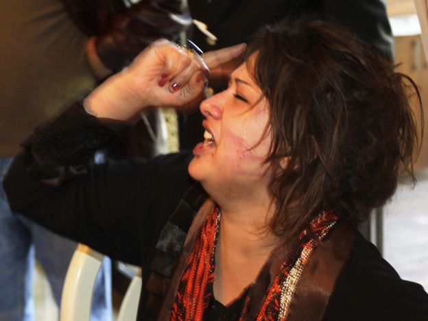 Iman al-Obeidi, who said she spent two days in detention after being arrested at a checkpoint in Tripoli, Libya,  and was sexually assaulted by up to 15 men while in custody, shouted as she told her story at the Rixos hotel in Tripoli on Saturday (March 26, 2011).