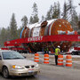 A coke drum waits along Montana's U.S. Highway 12 during a dry-run shipment in early March. The load can travel only late at night and is destined for a new oil refinery in Billings, Mont.