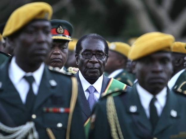 Zimbabwean President Robert Mugabe stands at his 2008 inauguration ceremony at the statehouse in Harare.