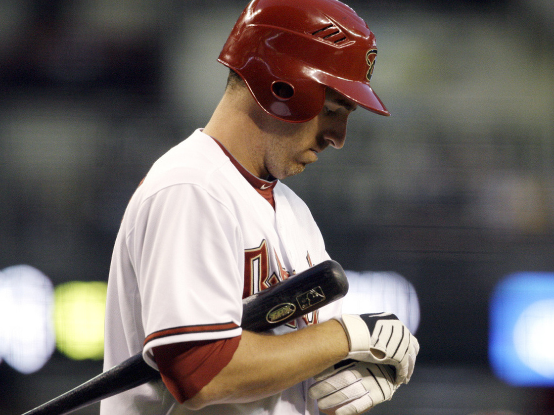 Blame The Gloves: Many baseball players, like the Arizona Diamondbacks' Adam LaRoche, fiddle with their batting gloves during each at-bat, stretching out their time at the plate.