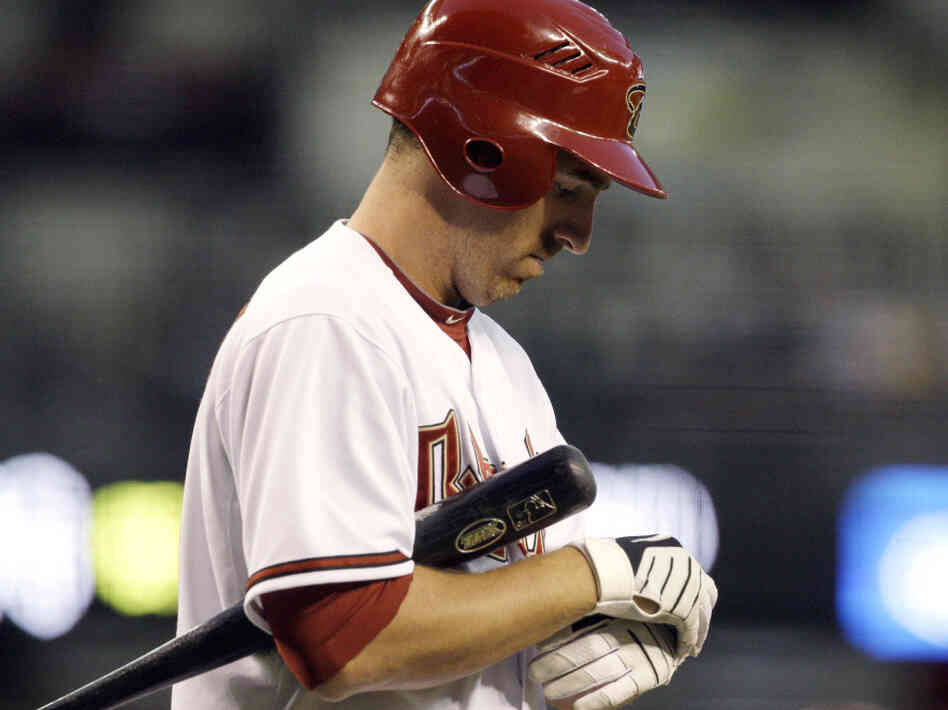 Blame The Gloves: Many baseball players, like the Arizona Diamondbacks' Adam LaRoche, fiddle with their batting gloves during each at-bat, stretching out their time at the plate.