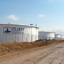 Huge tanks help house the oil surplus in Cushing, Okla. Each tank holds more than 250,000 barrels of oil. Huge tanks help house the oil surplus in Cushing, Okla. Each tank holds more than 250,000 barrels of oil.