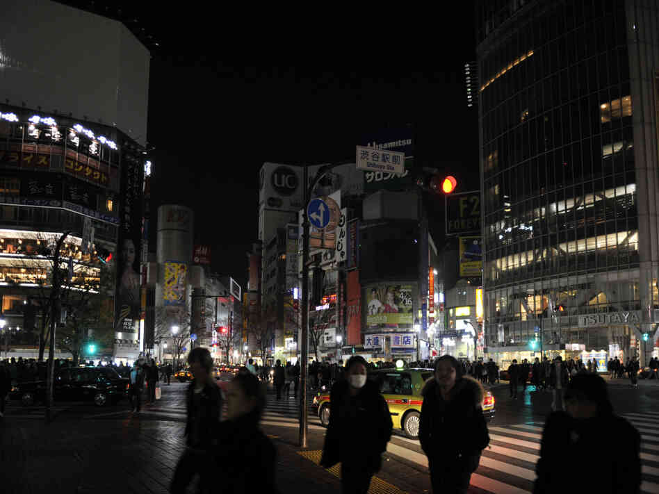 With its massive electronic billboards now dark, Tokyo's Shibuya fashion district is far more subdued than it was before the March 11 earthquake and tsunami.